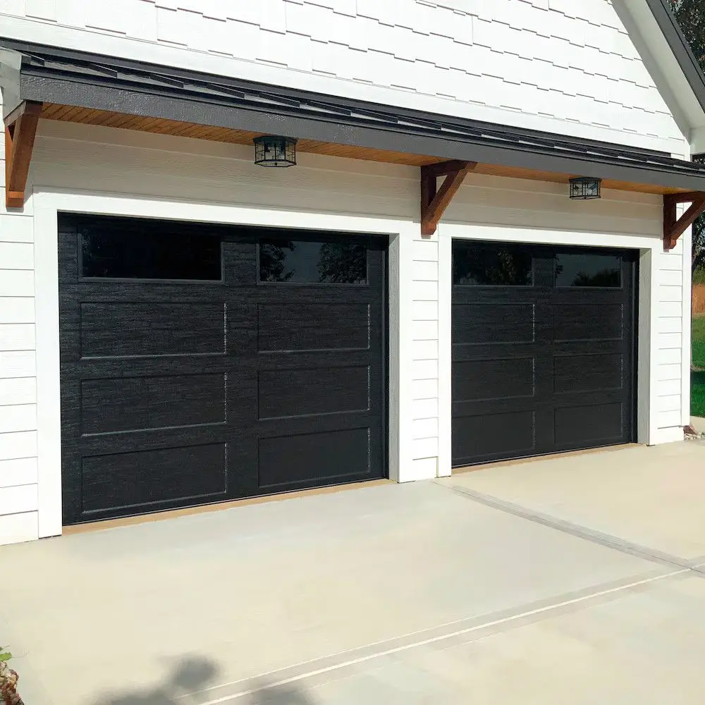 An insulated garage door with frosted glass windows, blending privacy and style.