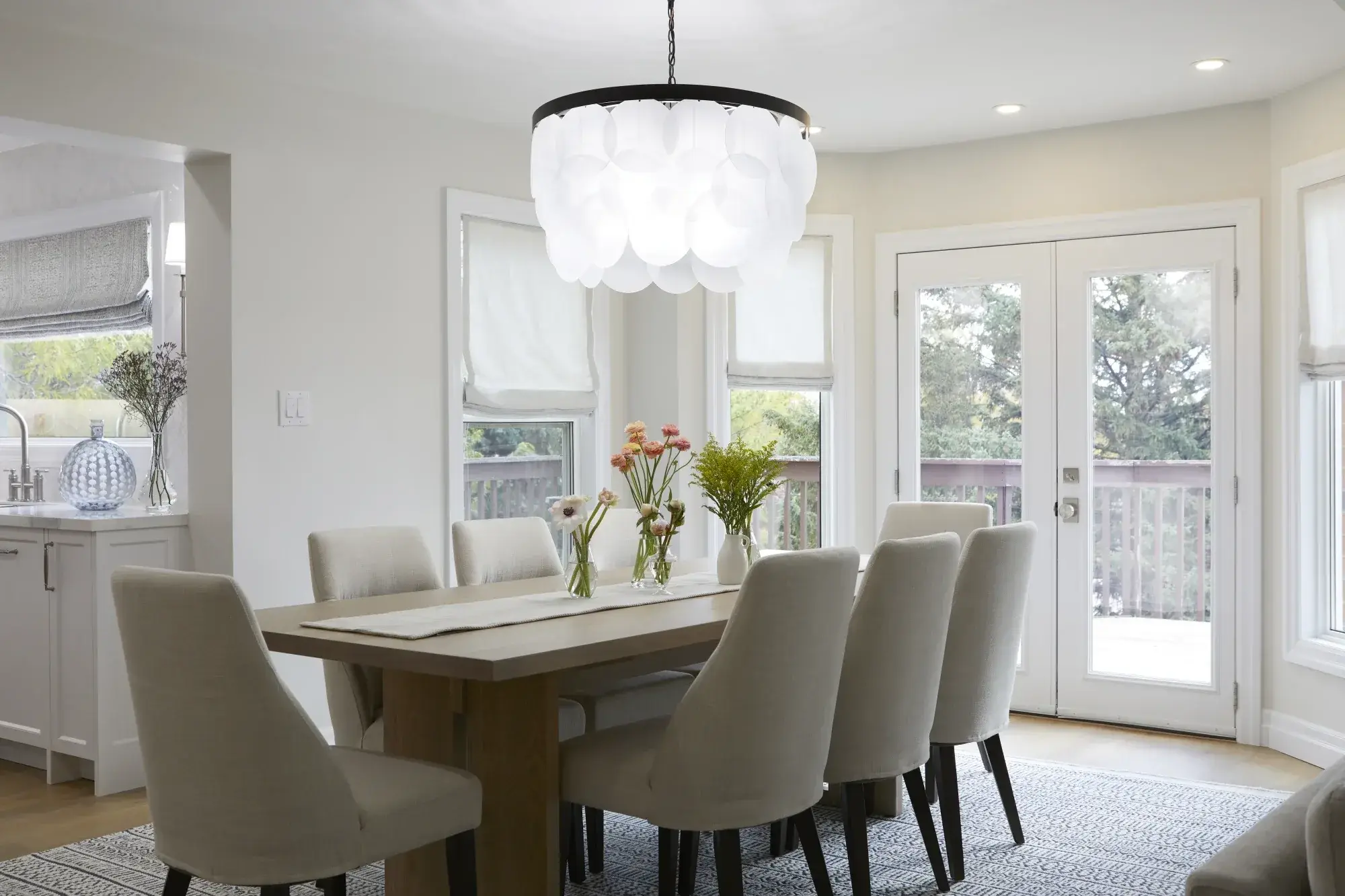 Bright living room interior painting with smooth white walls, crisp baseboards, and a finished Toronto home.