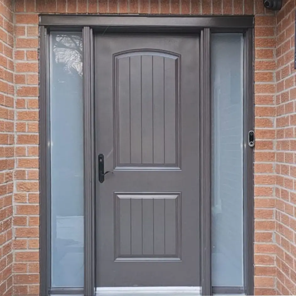 Modern entry door replacement with clean casing lines and a precise finished fit.