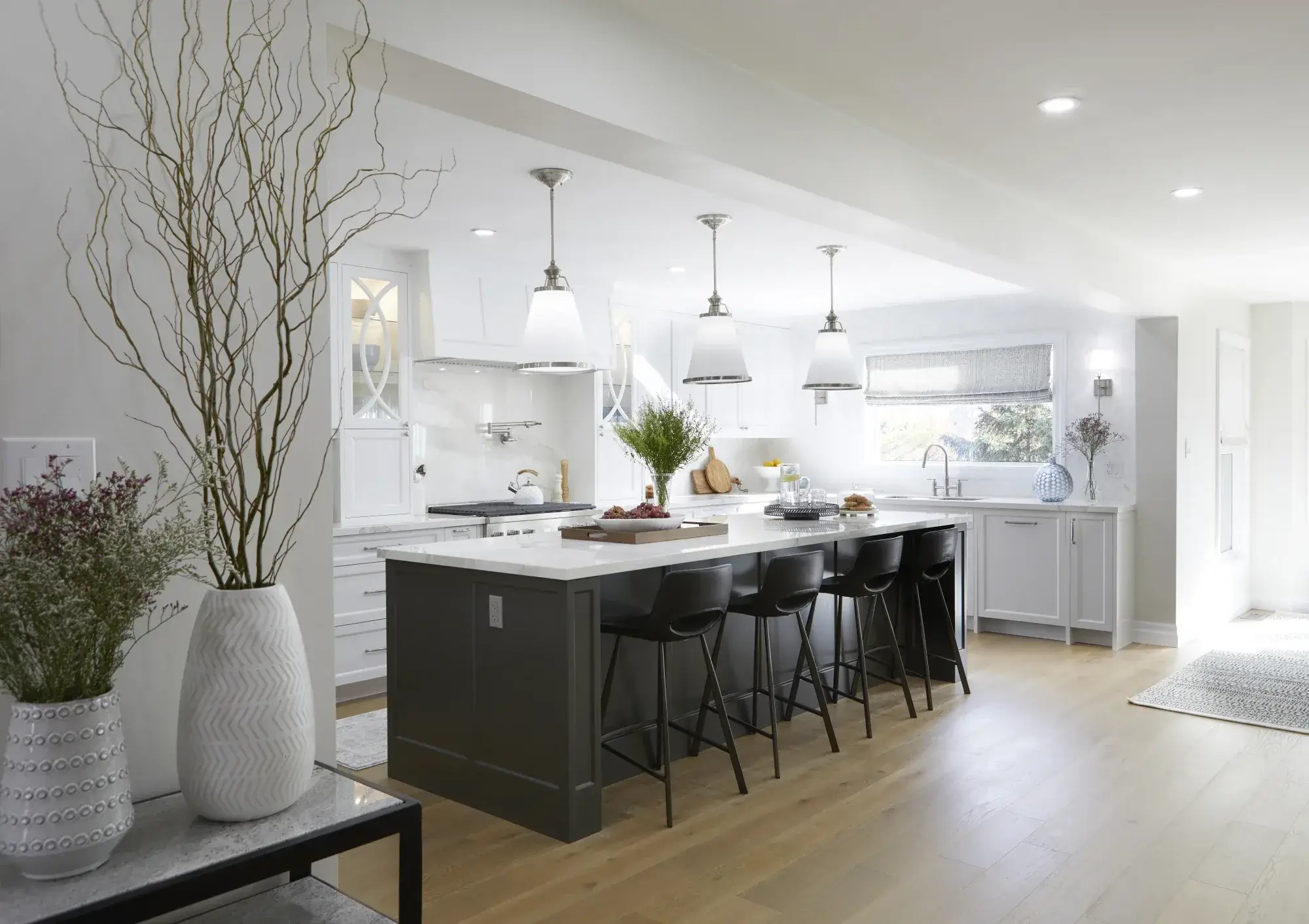 Luxury home interior painting with smooth white walls, hardwood floors, and finished modern living space.