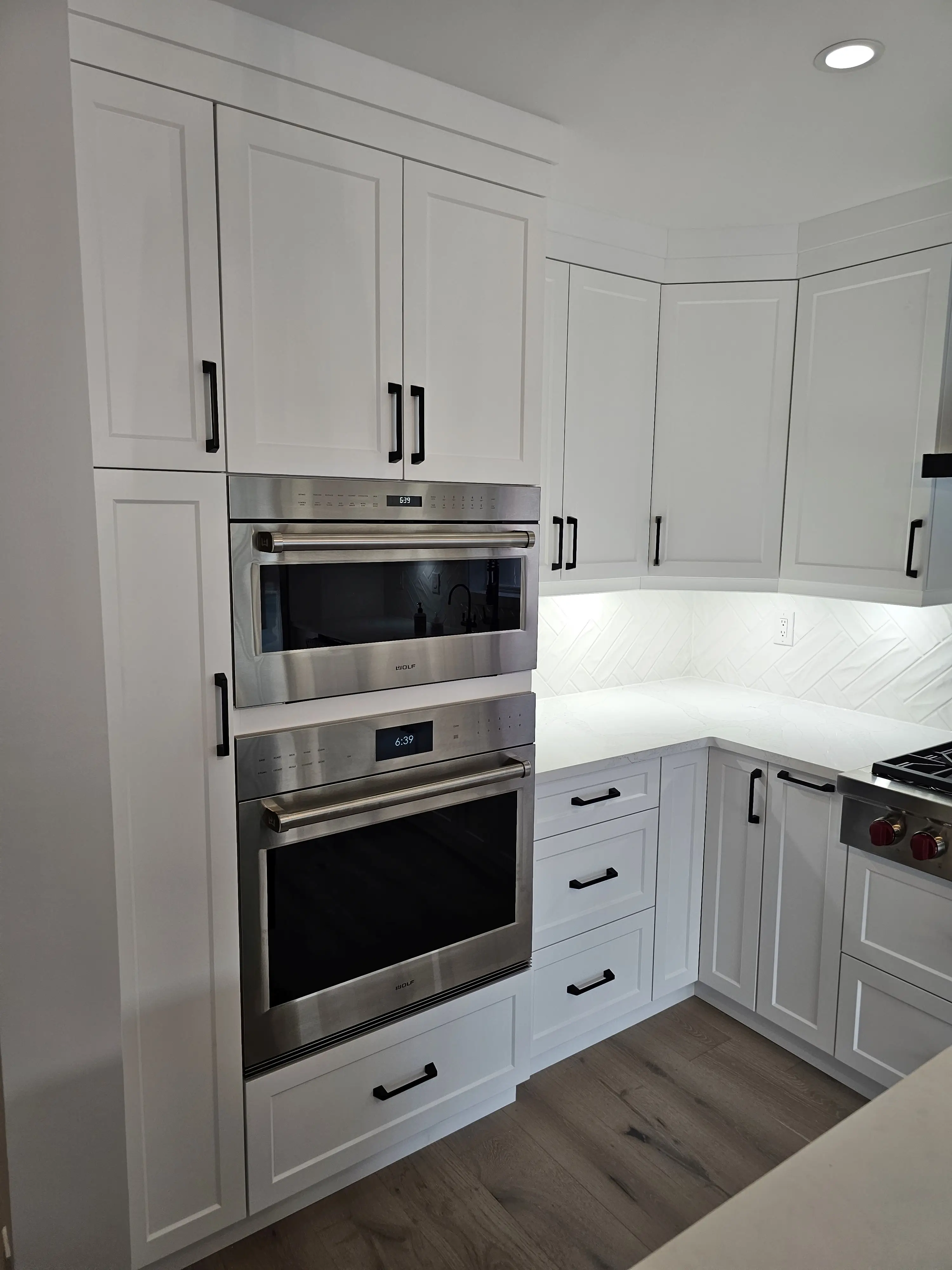 Premium kitchen repaint with crisp lines, satin cabinetry, and modern detailing.