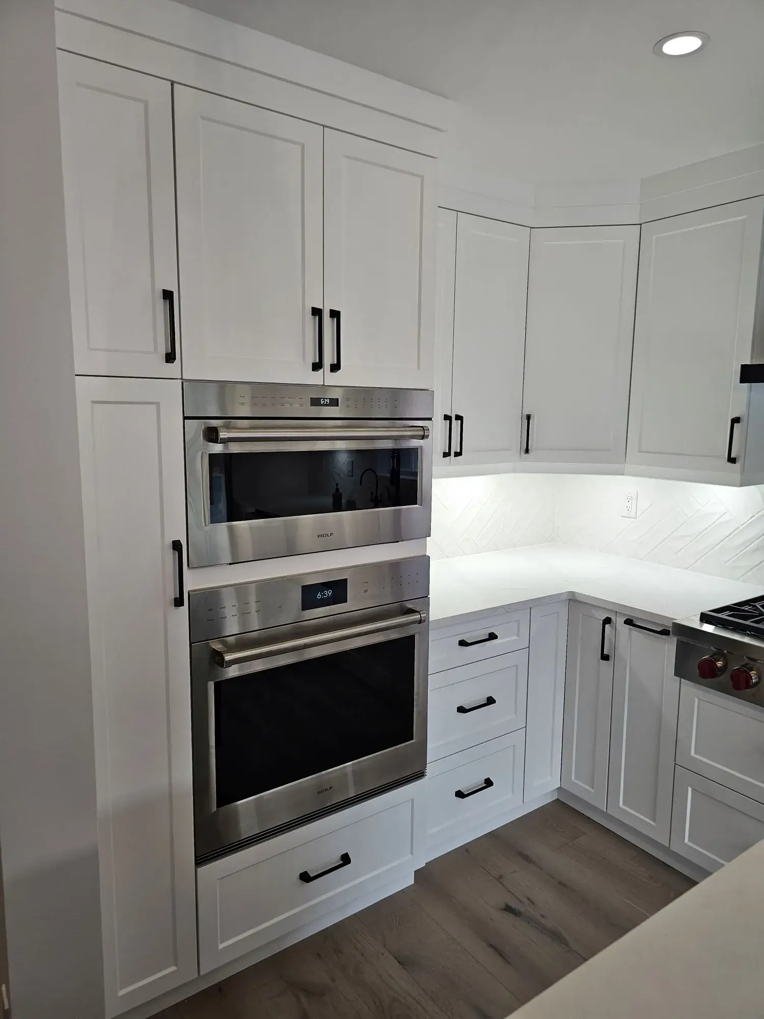 Kitchen cabinet painting with a smooth satin finish.