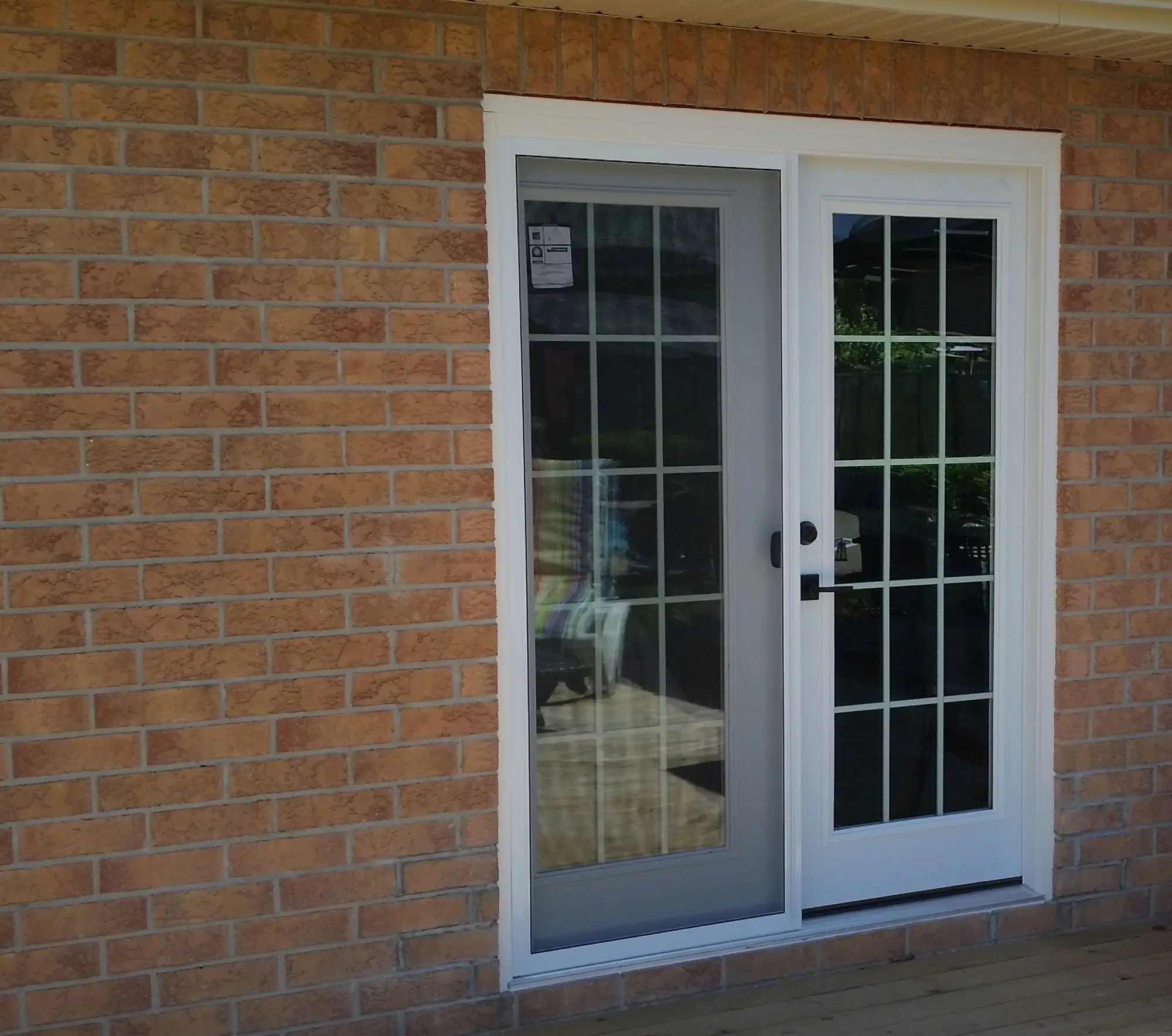 Patio door replacement with clean finished interior trim and smooth operation.