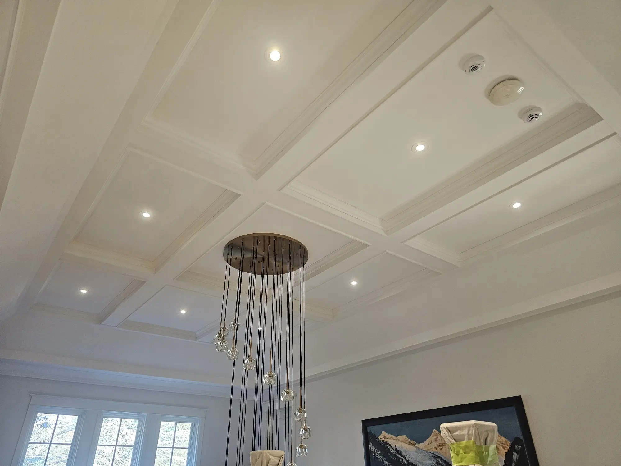 Dust-free popcorn ceiling removal in Toronto with a smooth modern finish.
