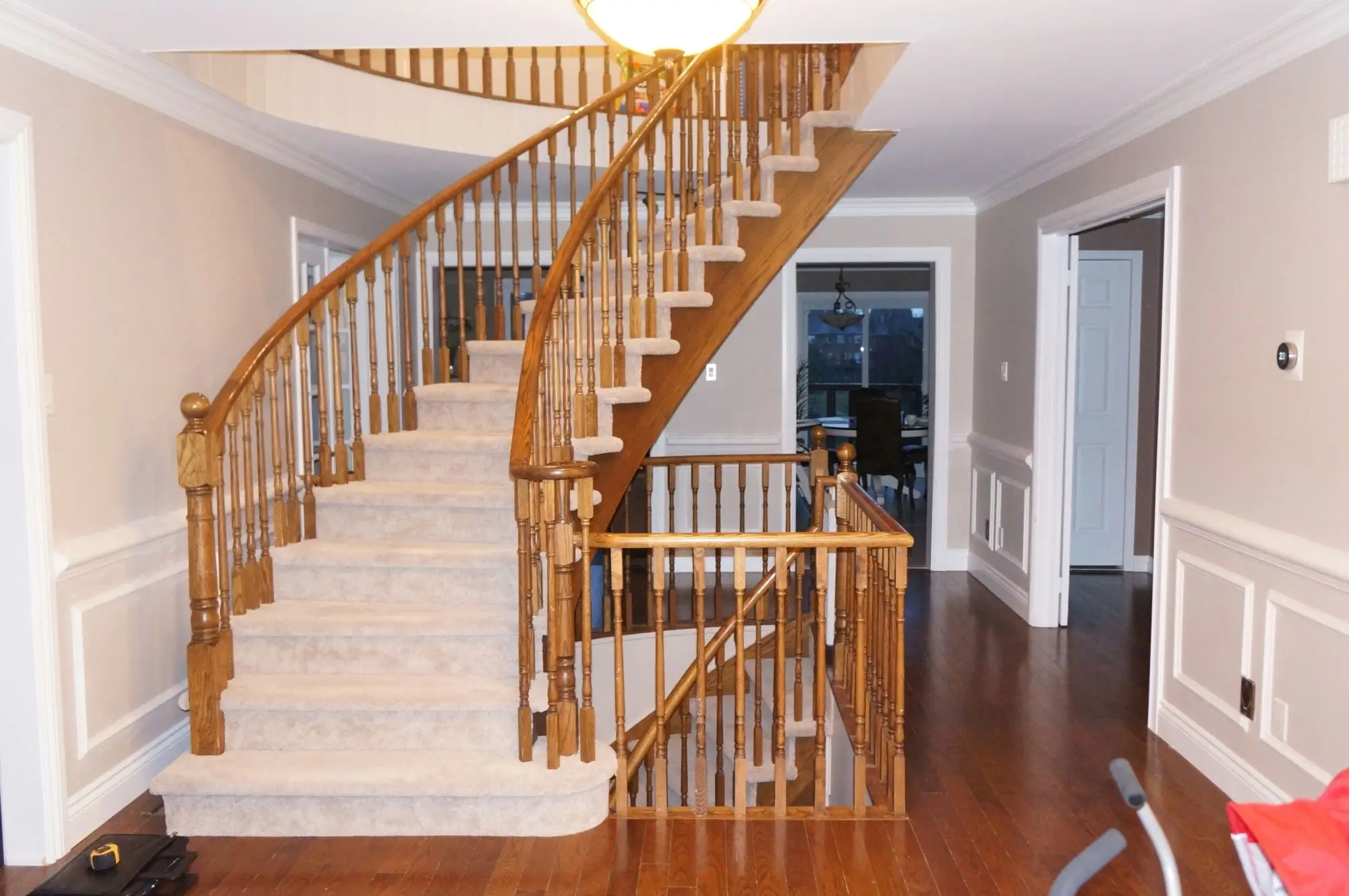 Existing staircase before stair railing upgrade in King City.
