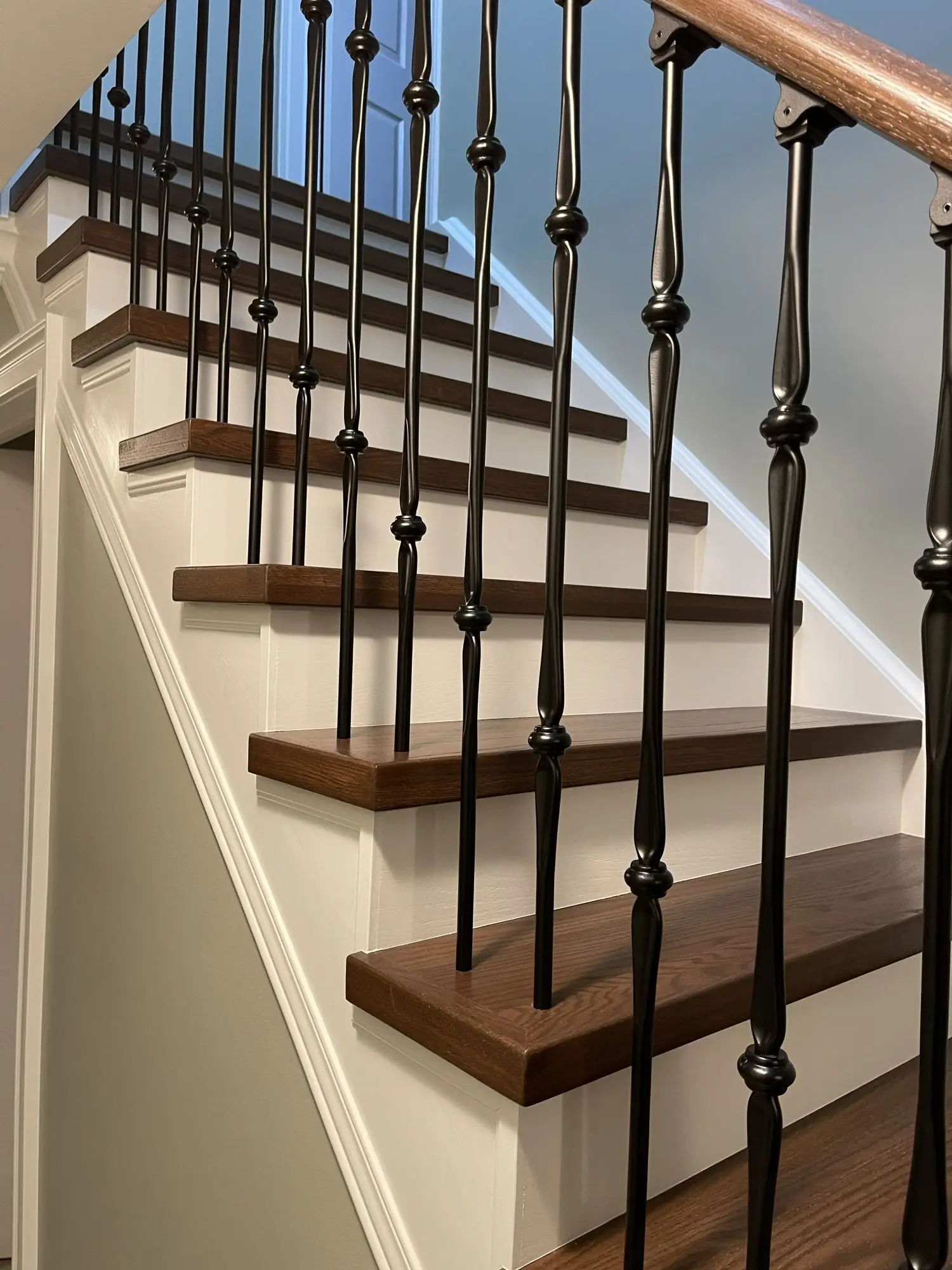 Hardwood staircase with upgraded railing in Oakville.