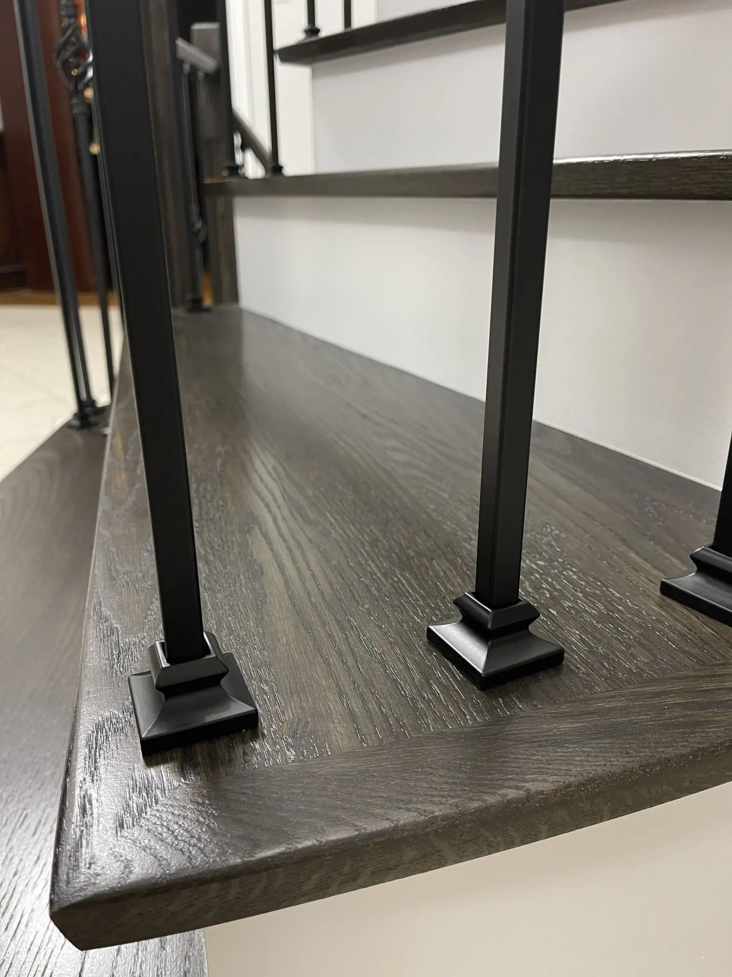 Stair railing upgrade paired with improved stair surfaces in Vaughan.