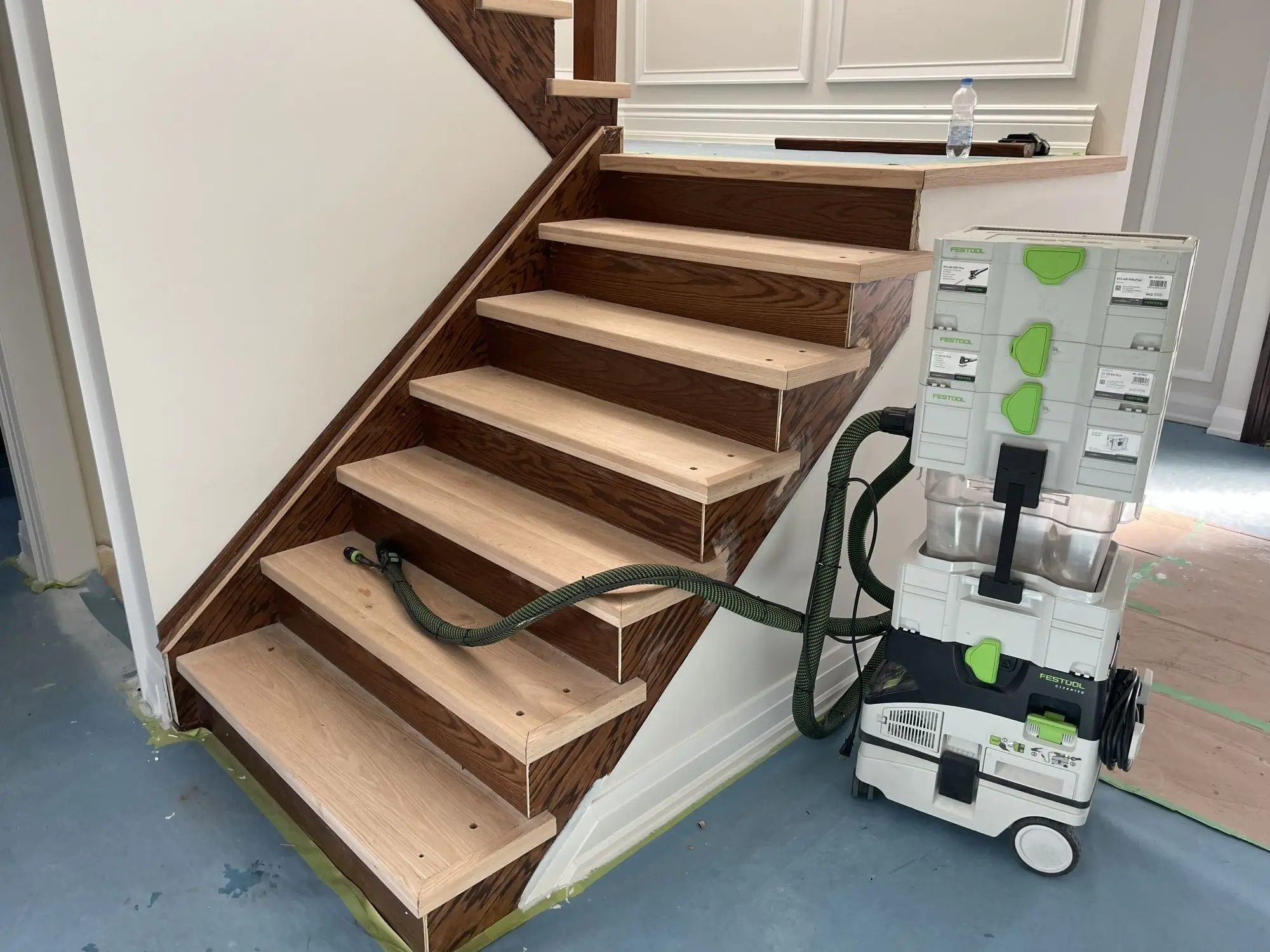 Dust-free staircase sanding with Festool equipment.