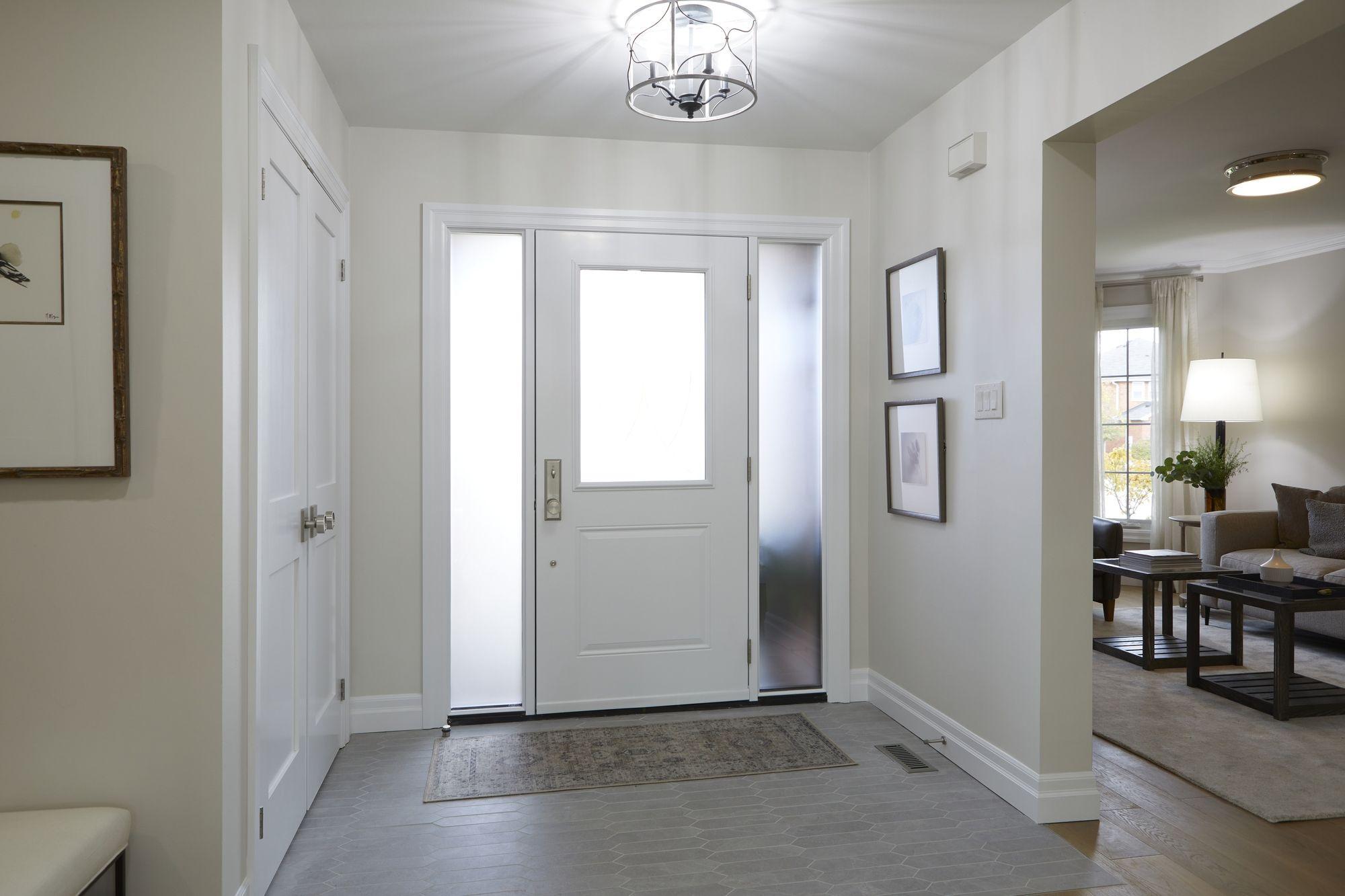 Installed doors and windows with completed interior trim details.