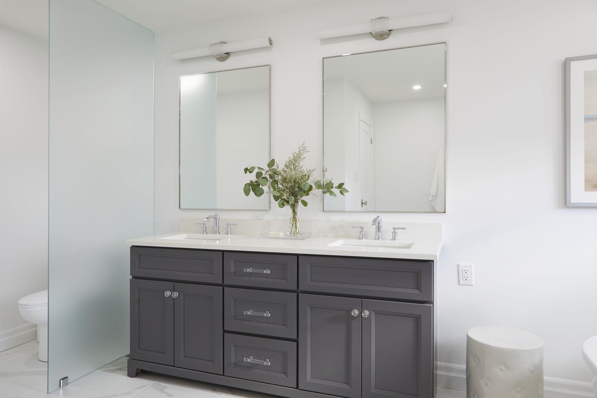 Toronto bathroom renovation with a double vanity and coordinated finishes.