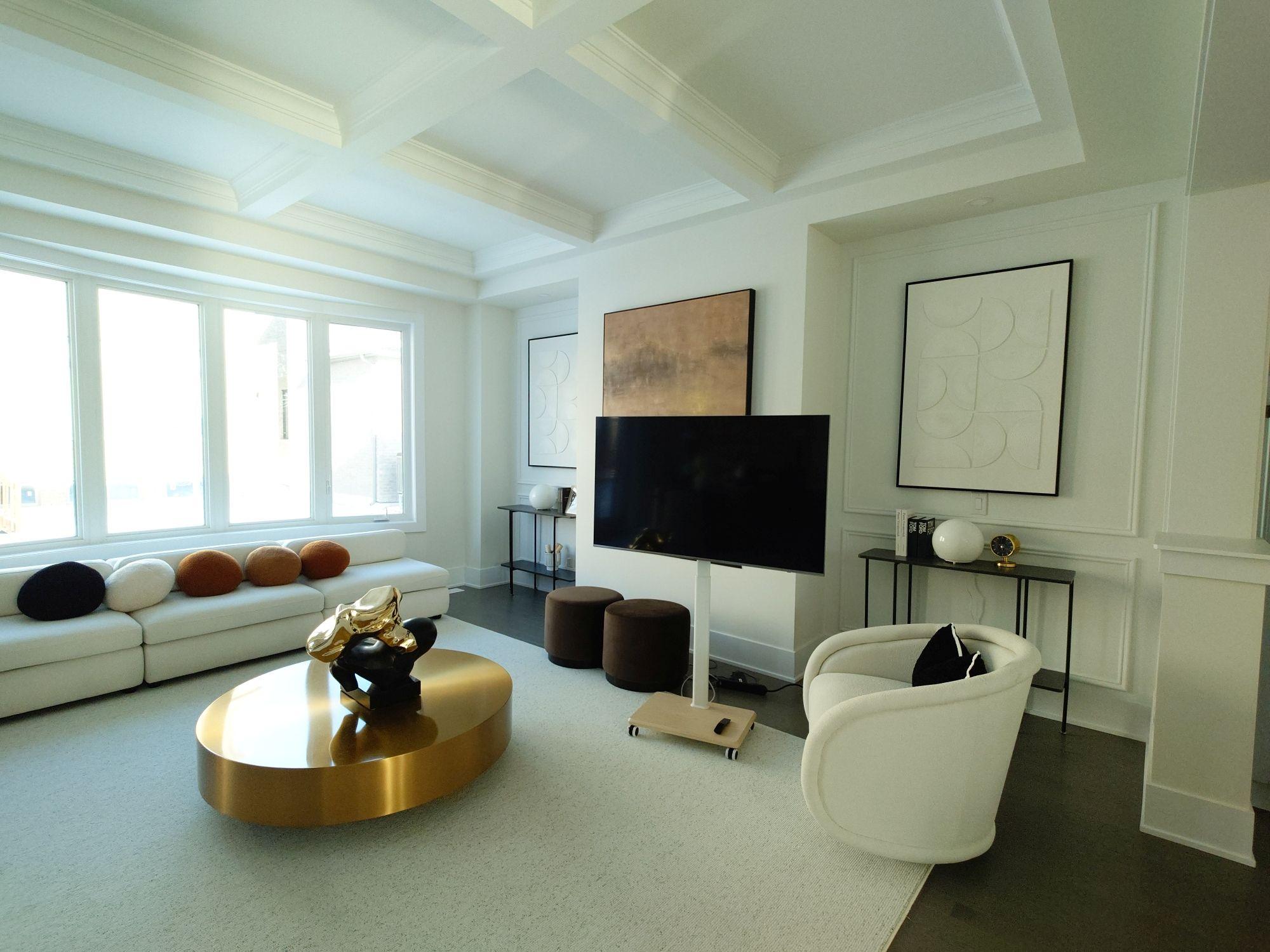 Finished Toronto living room with coordinated interior painting and trim.
