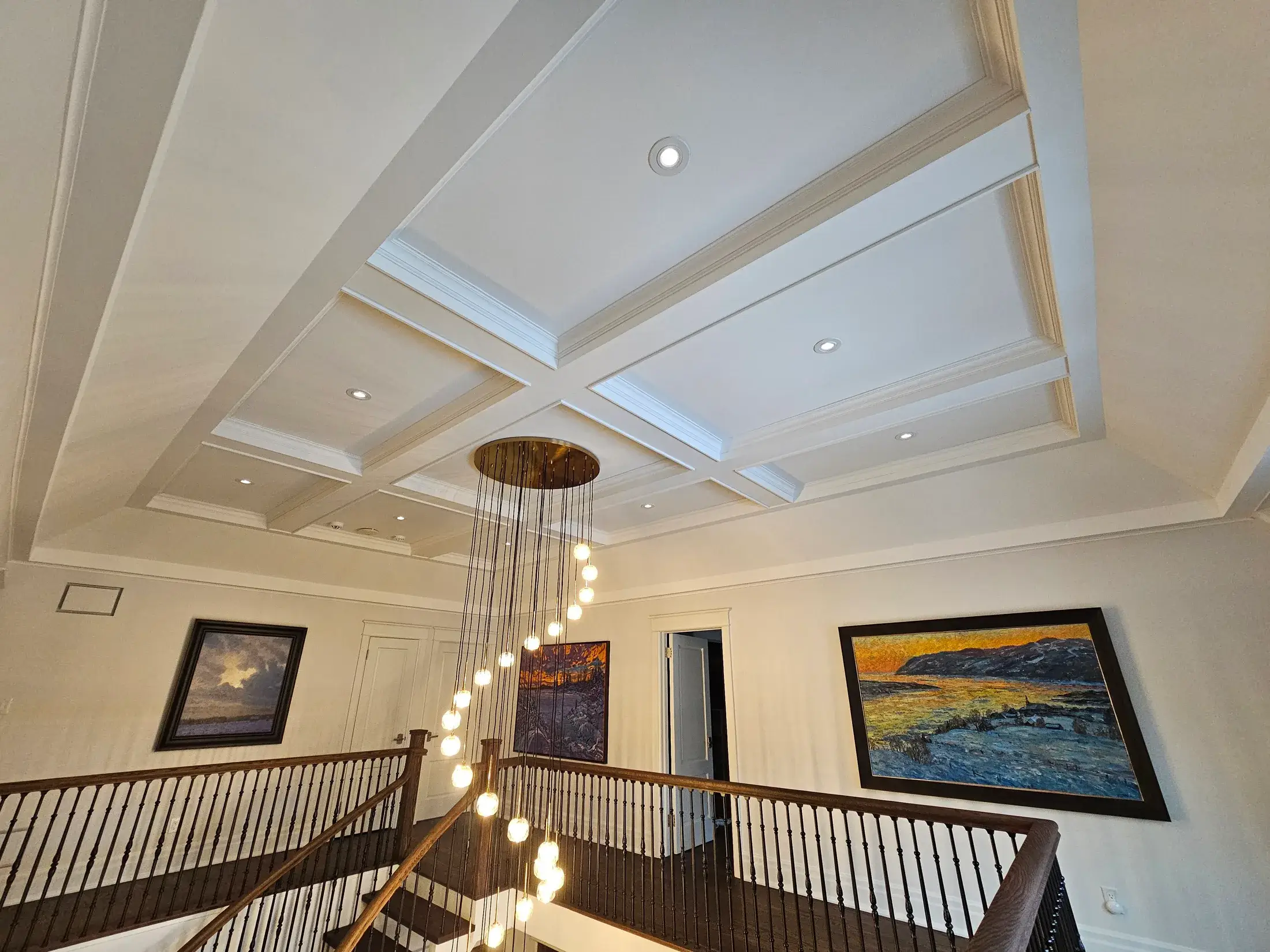 Vaughan interior painting with a freshly painted coffered ceiling, clean trim, and bright foyer walls.