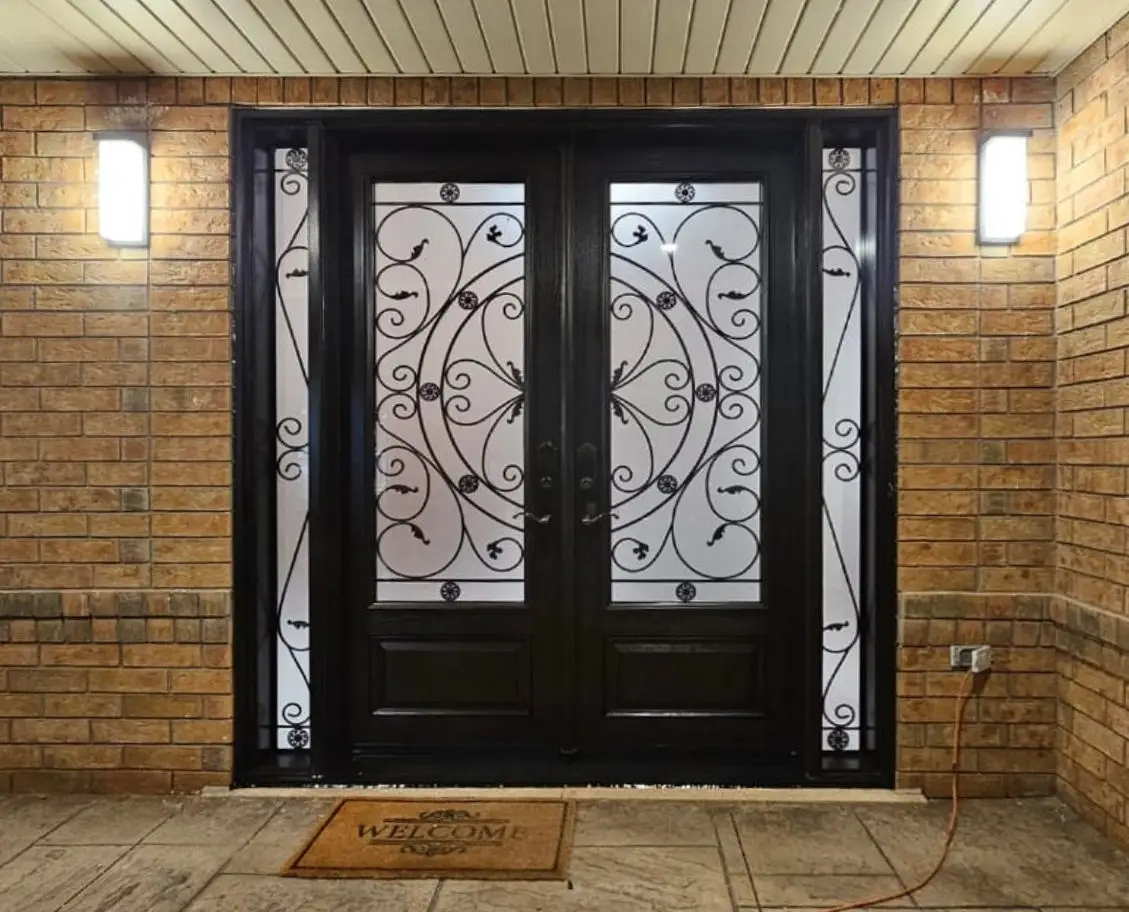 Contemporary front door installed with decorative glass insert.