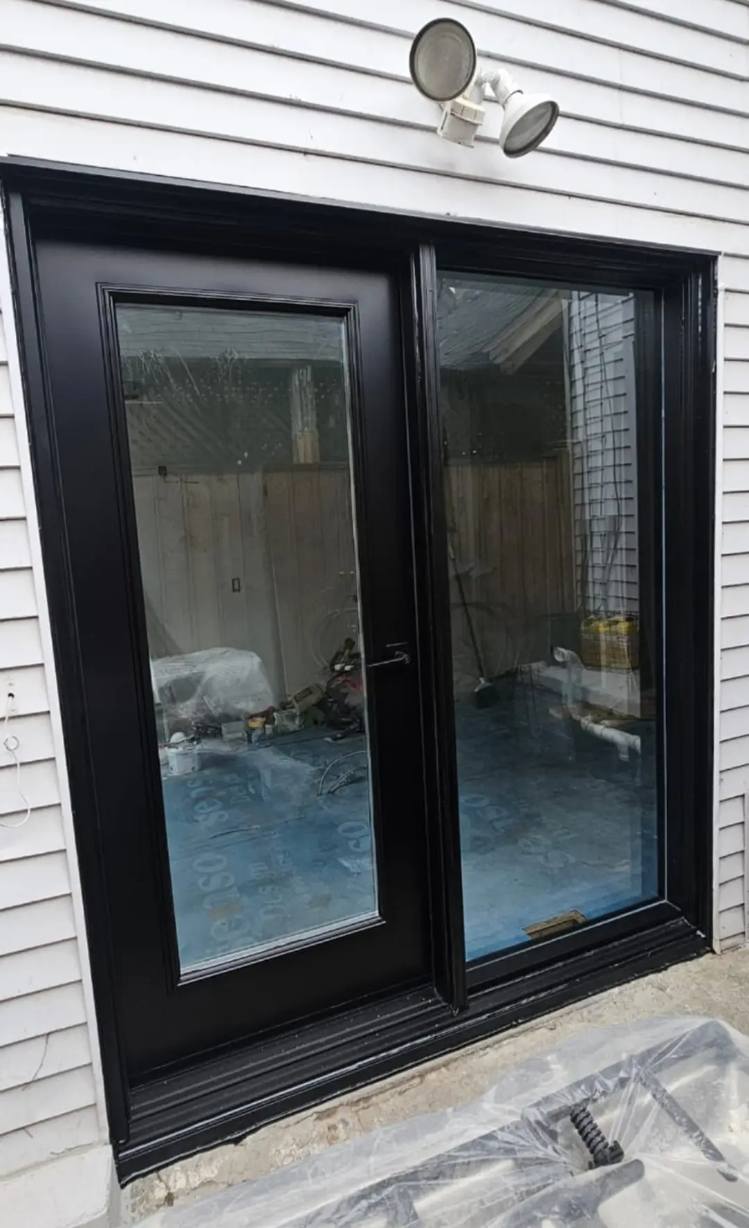 Vinyl patio door with large glass panels for natural light.