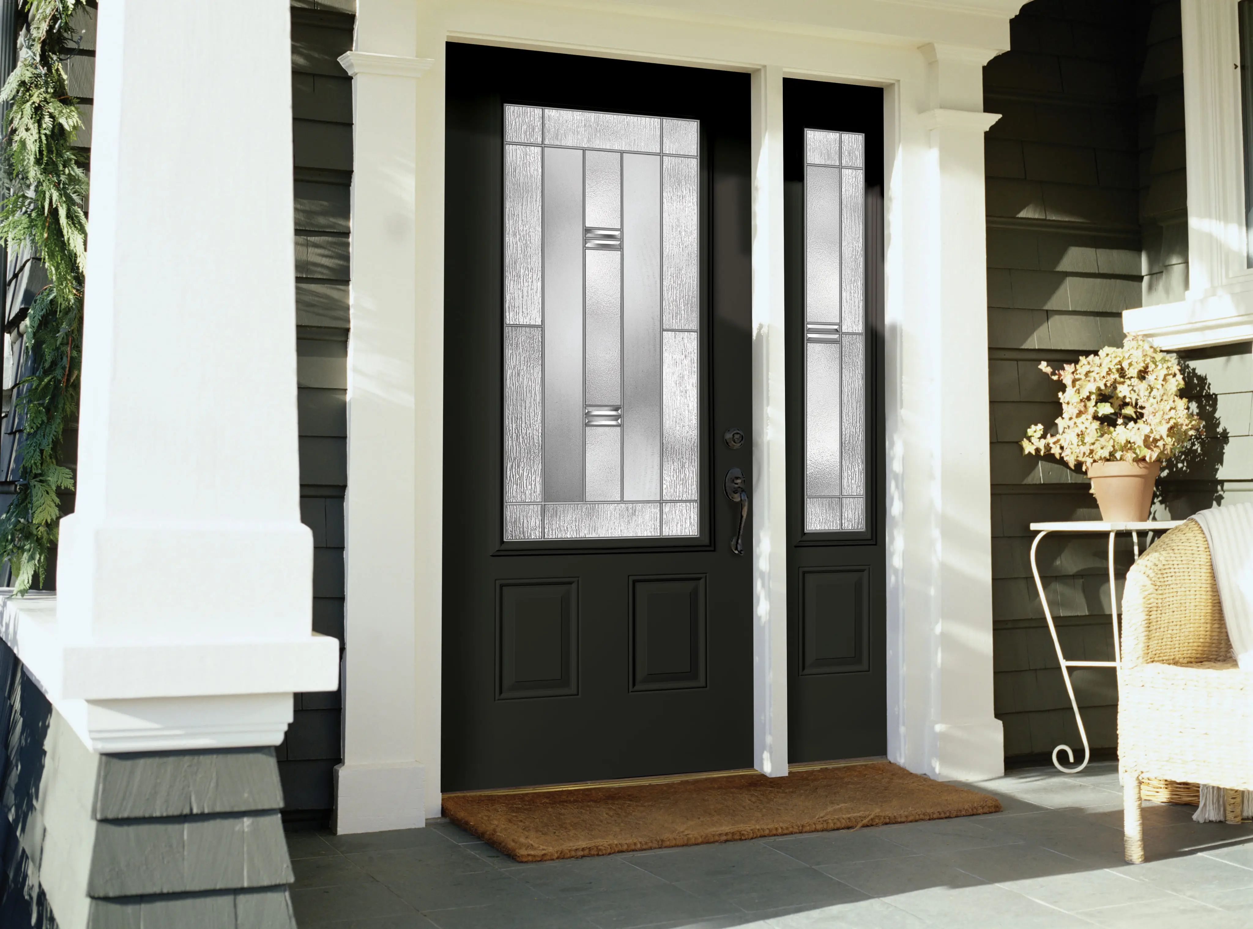 Exterior entry door replacement with decorative glass and clean finishing.