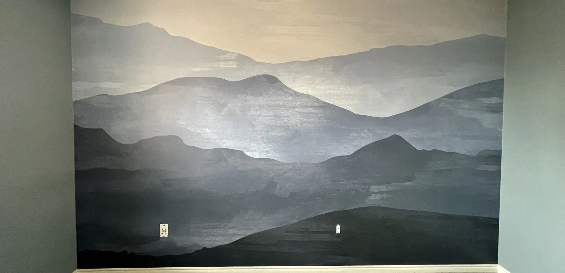 Geometric patterned wallpaper in a stylish office space.